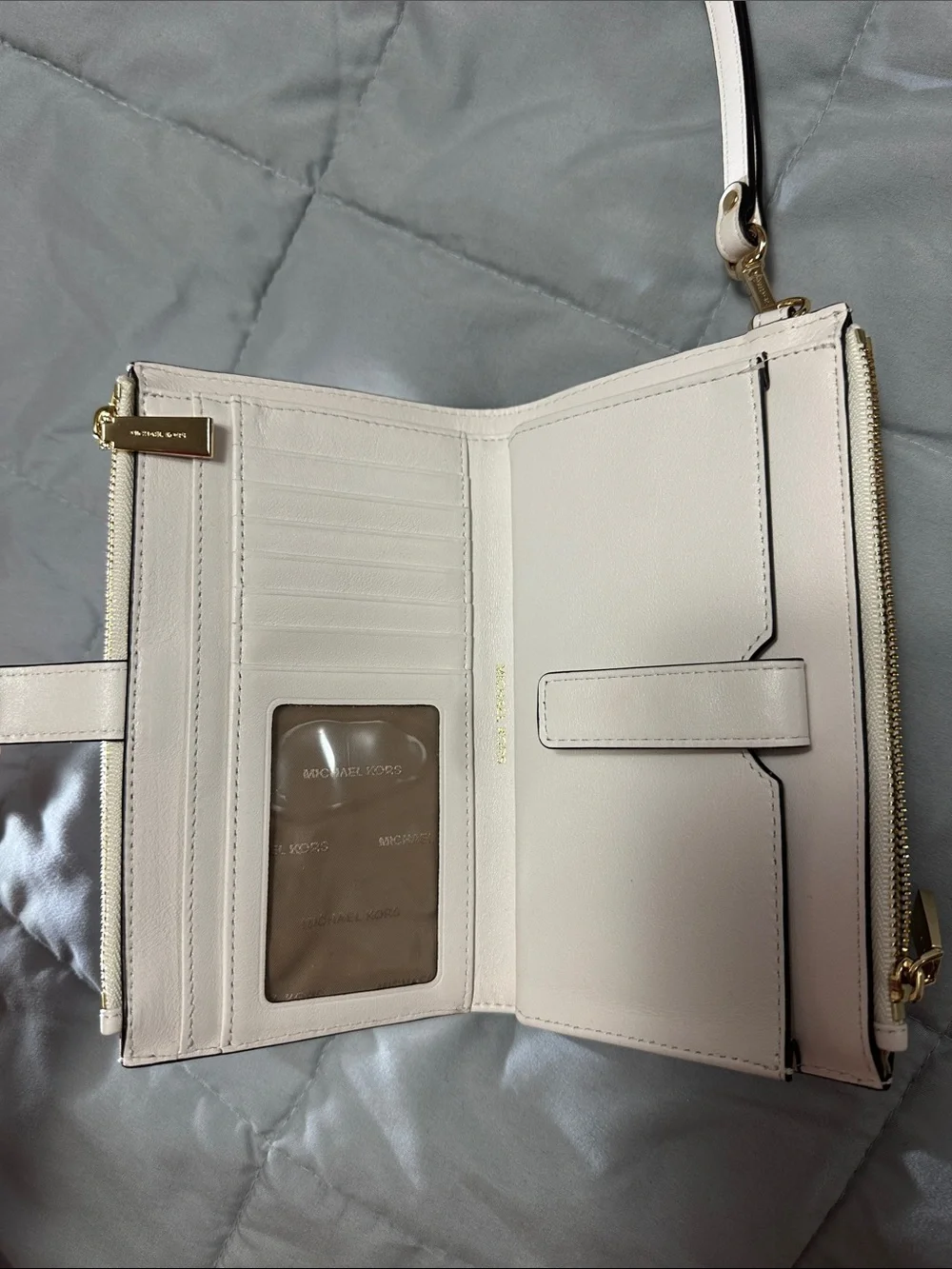 Michael Kors White Wristlet with Gold Floral Accents